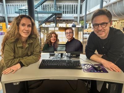 Bibliotekschef Lone Føgh Westphall og projektleder Henrik Gadegaard - både som rigtige mennesker og i AI-version på skærmen.